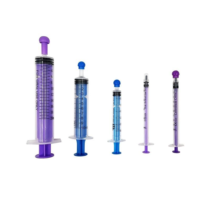 Colored Oral/Enteral Syringe with Tip Cap for Feeding