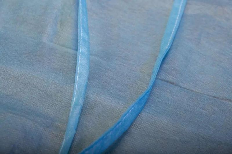 Disposable Medical Isolation Gown Low Price Blue PP Non-Woven Fabric 35g