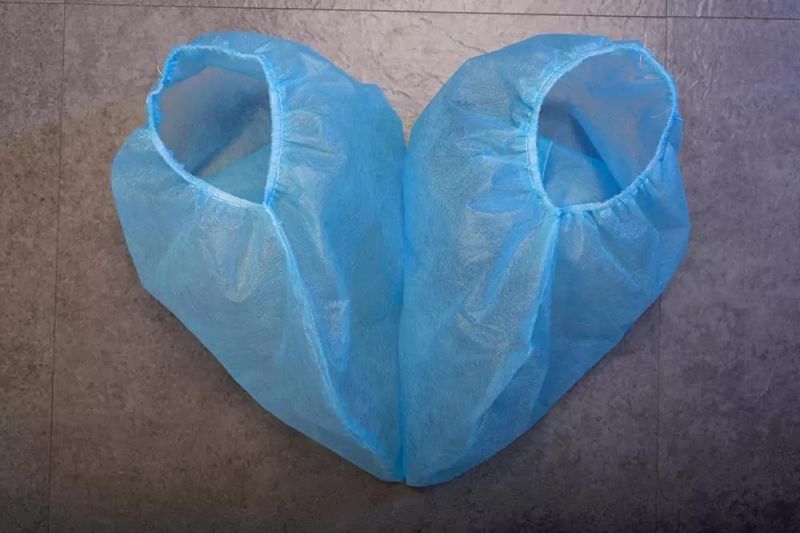 Disposable Medical Isolation Gown Low Price Blue PP Non-Woven Fabric 35g