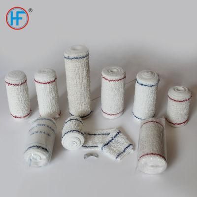 Mdr CE Approved Cleaning Resistant Red Line Dressing Cotton Crepe Bandage with Elastic Band Clip