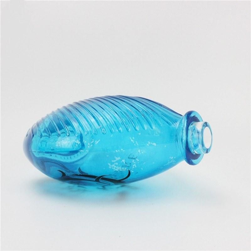 Customized Design OEM ODM Blue Empty Customized Round Shape Vodka 1200ml Gin Clear Whisky Rum Vodka Brandy Glass Bottles