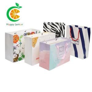 China Wholesale Custom Logo Printing Brown Kraft Biodegradable Gift Packaging Fashion Shopping Machine Paper Bags