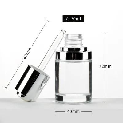 1oz 30 Ml Round Clear Cosmetic Essential Oil Serum Glass Press Pump Push Button Dropper Bottle with Cap
