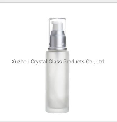 Cosmetic Bottle with Silver and Gold Caps for Face Care