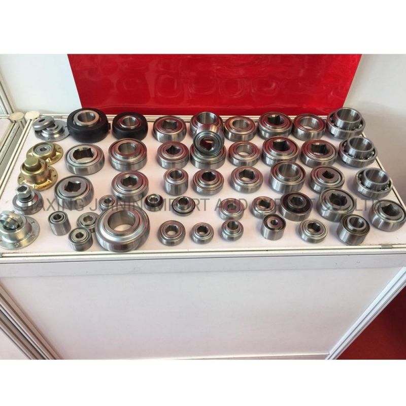 Fd209rj Fd209rja Fd209re Disc Harrow Bearing Quality Relubricable Farm Machinery Bearing Housing Round Bore Heavy Duty Bearing with Stamping Housing