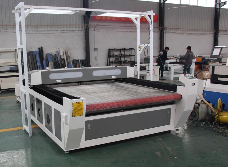 Dual Heads CO2 Laser Cutting Machine with Auto Feeding System for Fabric Fiberglass Garment Leather