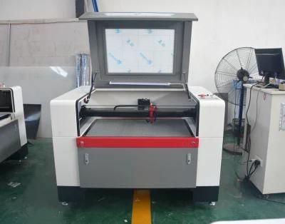 Wood Acrylic Marble Glass Engraving Machine with CO2 Laser Tube Flc9060