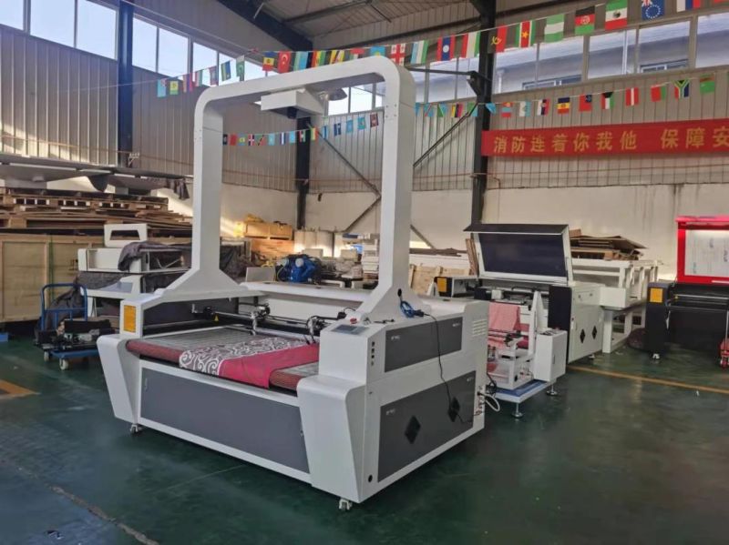 Fabric Cloth Garments Leather Fiberglass CO2 Laser Cutting Machine Flc1610c with Auto Feeding