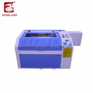 Low Price Multy Function Laser Leather Plywood Engraving Machine for Ce ISO FDA Certificate