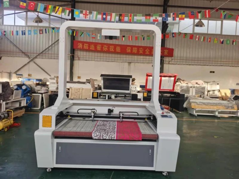Fabric Cloth Garments Leather Fiberglass CO2 Laser Cutting Machine Flc1610c with Auto Feeding