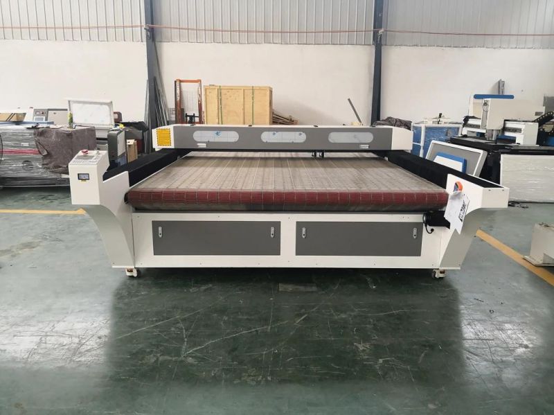 Fabric Cloth Garments Leather Fiberglass CO2 Laser Cutting Machine Flc1610c with Auto Feeding