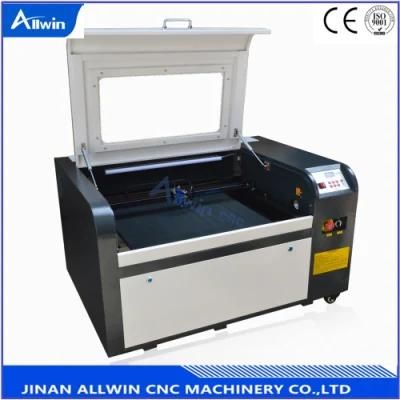 China 1390 CO2 CO2 Tube Laser Cutting Machine Cheap Price