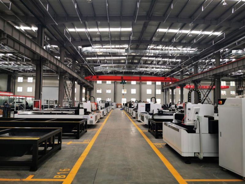 Enclosed Metal Tube and Plate CNC Fiber Metal Laser Cutting Machine with Exchange Table Laser Machine