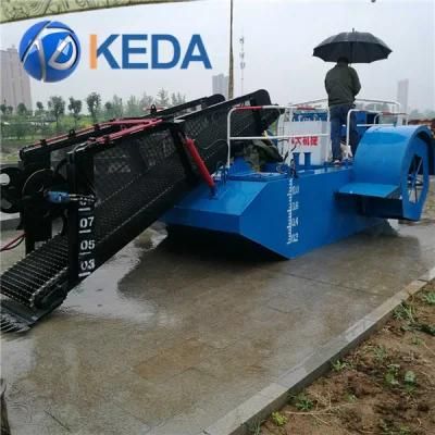 Water Lily, Water Hyacinth, Reed and Floating Grass in River Combine Harvester